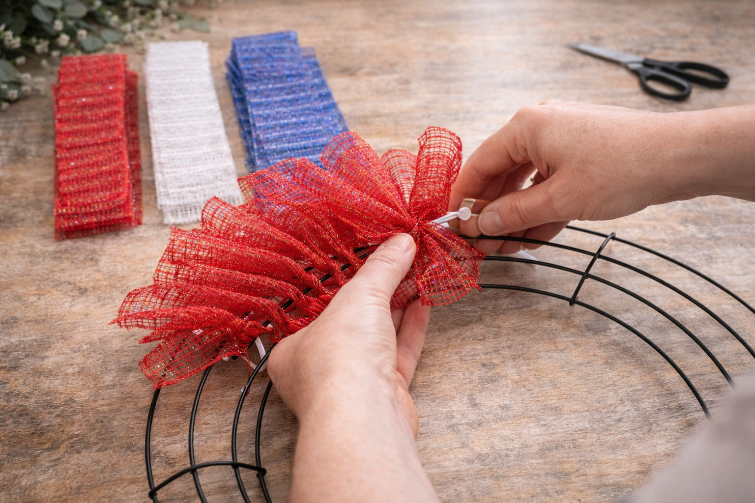 How to attach red mesh ruffles - Sparkling Patriotic Deco Mesh Wreath DIY tutorial