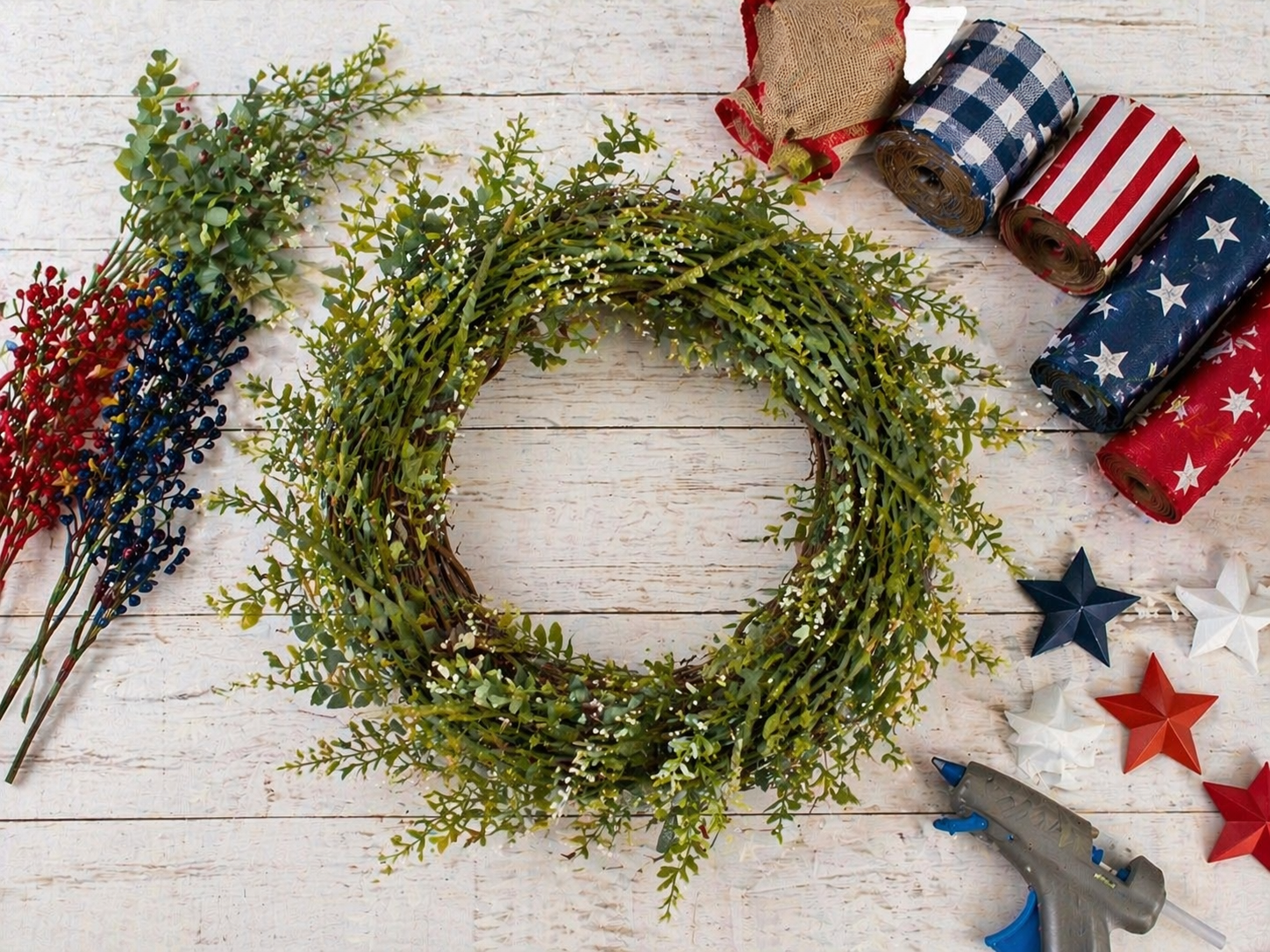 How to add the greenery - God Bless America Rustic Wreath DIY tutorial