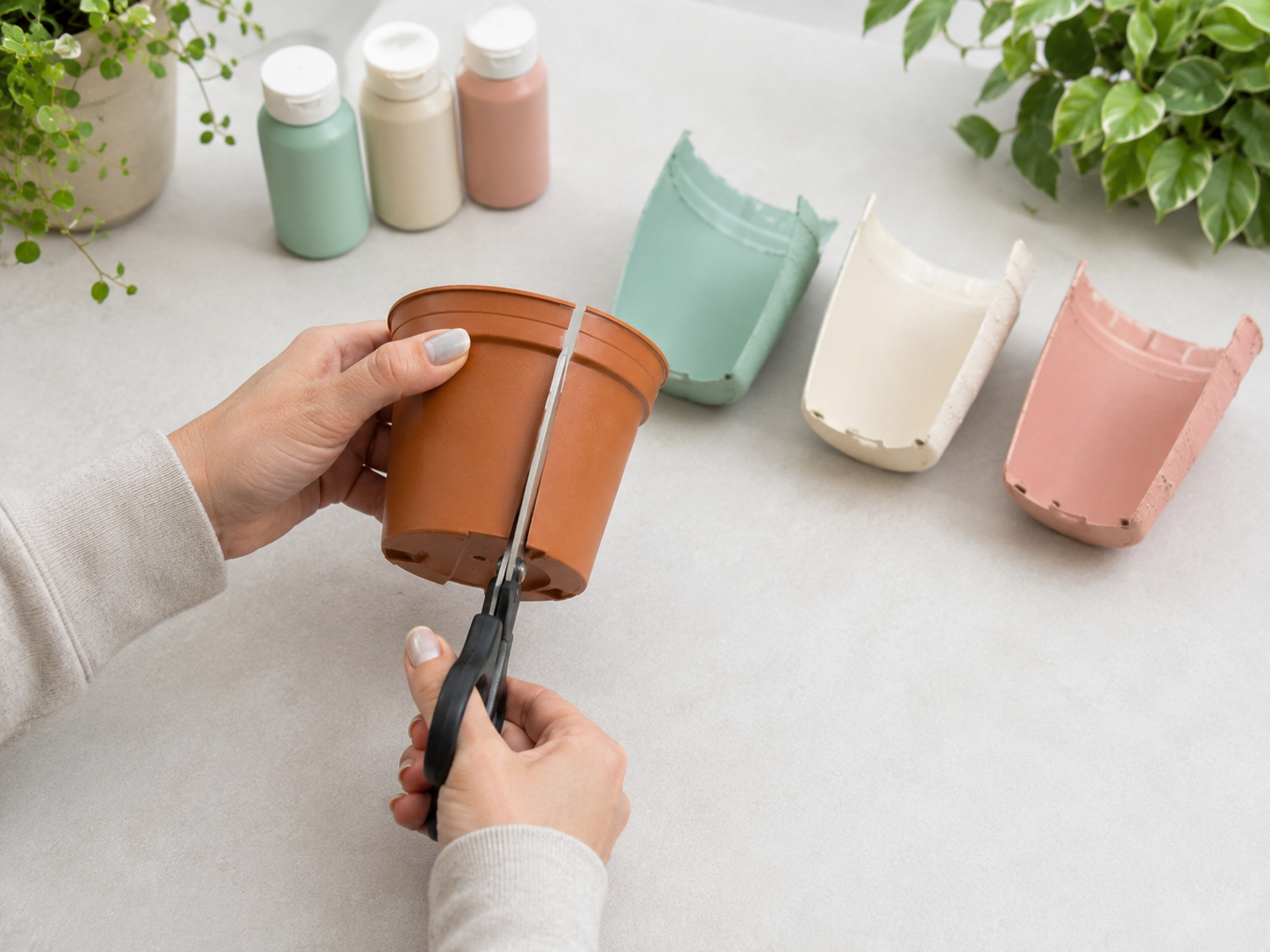 How to cut & paint half pots - Charming Dollar Tree Succulent Wall Planter DIY tutorial