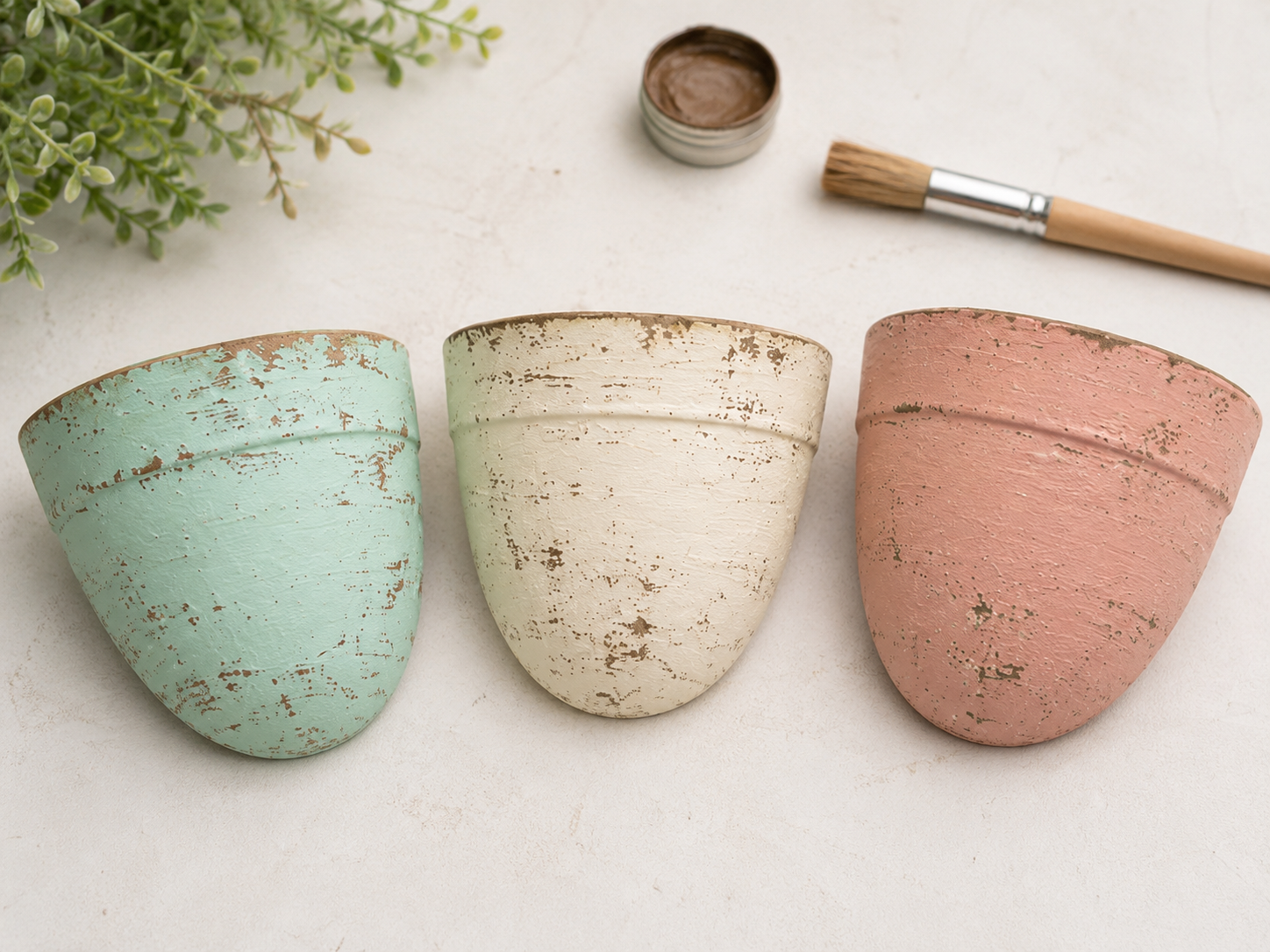 How to age the half pots - Charming Dollar Tree Succulent Wall Planter DIY tutorial