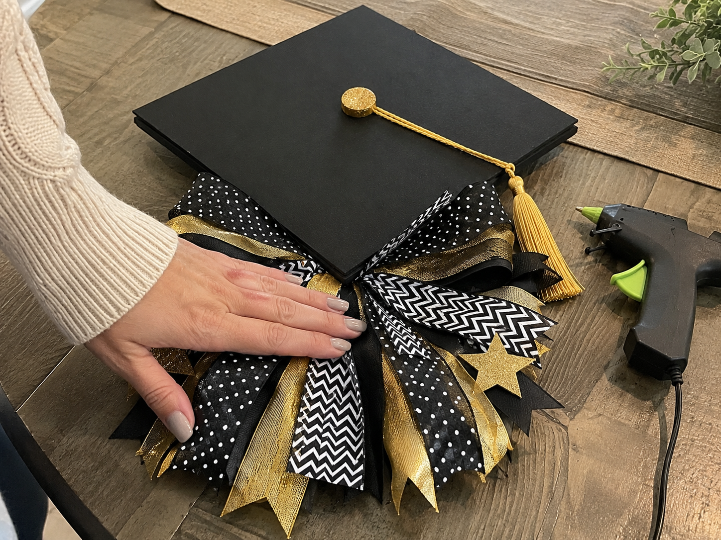 How to attach ribbon cluster - DIY Dollar Tree Graduation Cap Door Hanger DIY tutorial