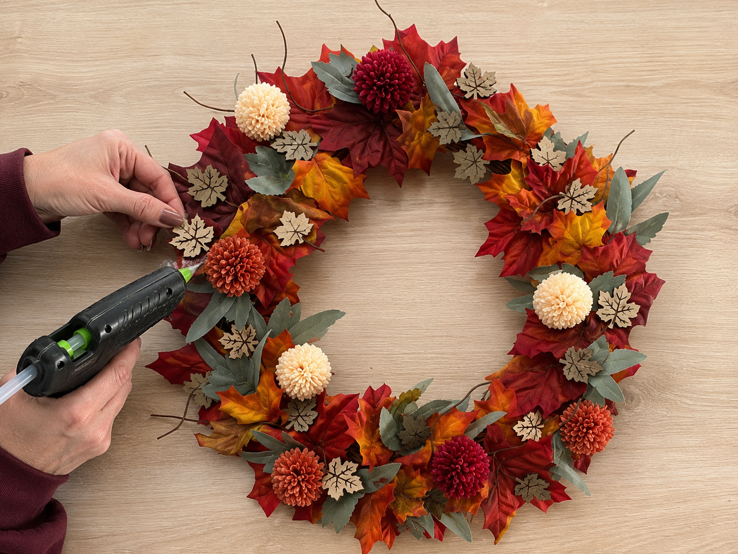 How to place mini wooden leaf accents - Harvest Haven Wreath: A Dollar Tree-Style Fall Statement DIY tutorial