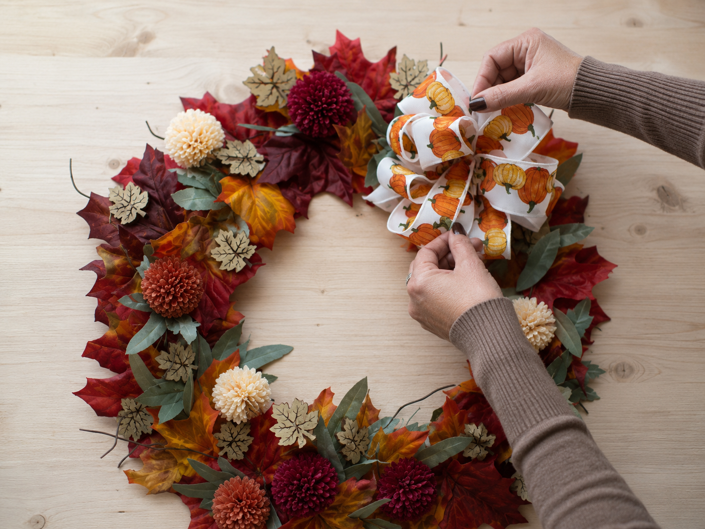 How to create & attach pumpkin bow - Harvest Haven Wreath: A Dollar Tree-Style Fall Statement DIY tutorial