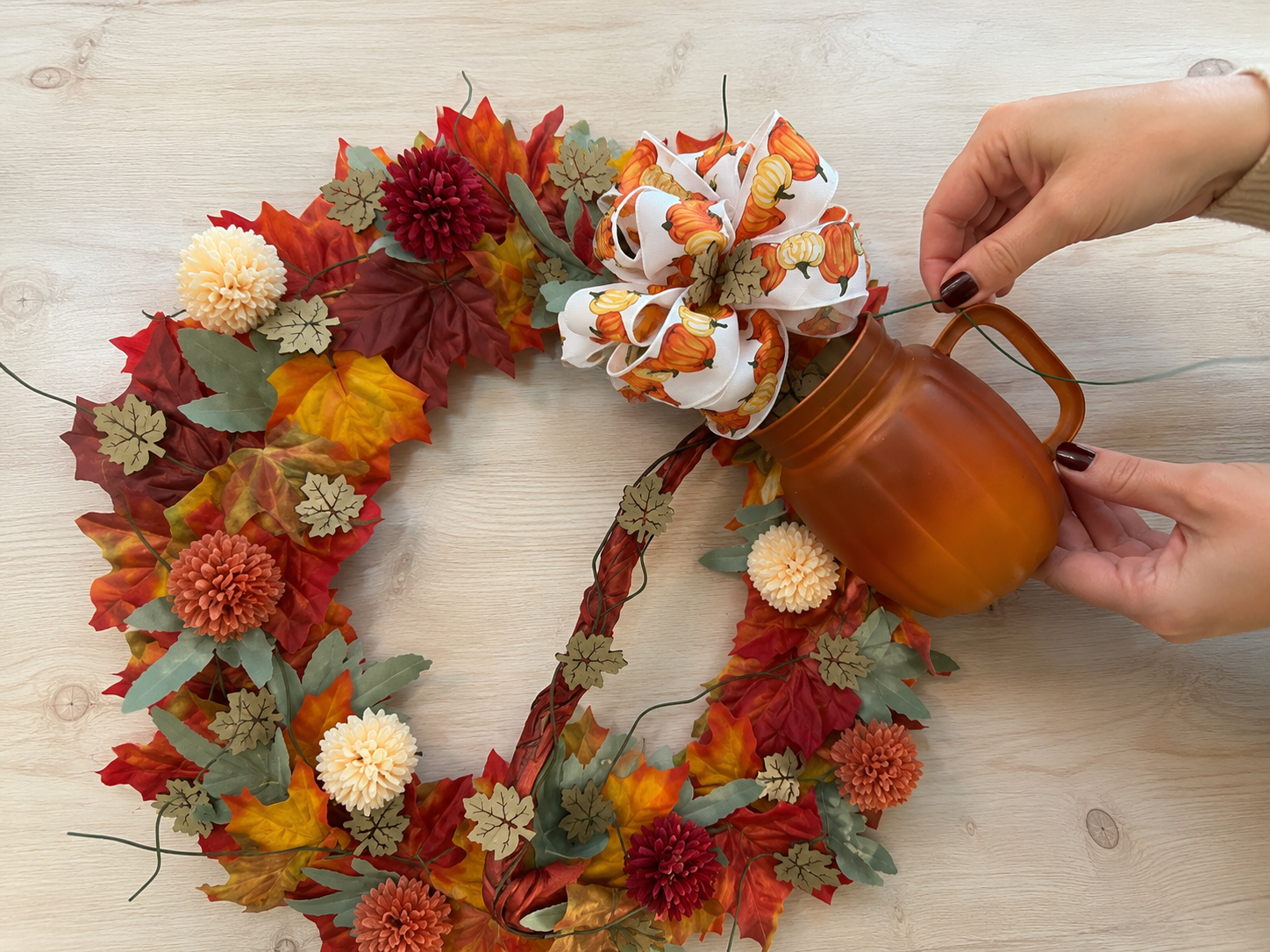 How to attach tilted watering can - Harvest Haven Wreath: A Dollar Tree-Style Fall Statement DIY tutorial