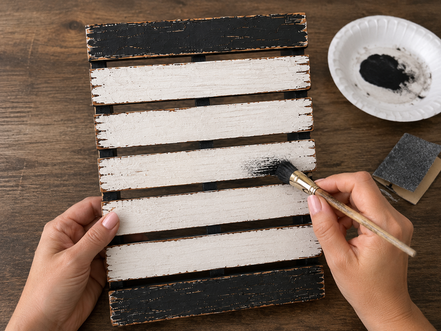 How to distress with black paint - Rustic Farmhouse Halloween Pallet Pocket DIY tutorial