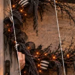 DIY Gothic Crescent Moon Halloween Wreath with Lights for a Front Door