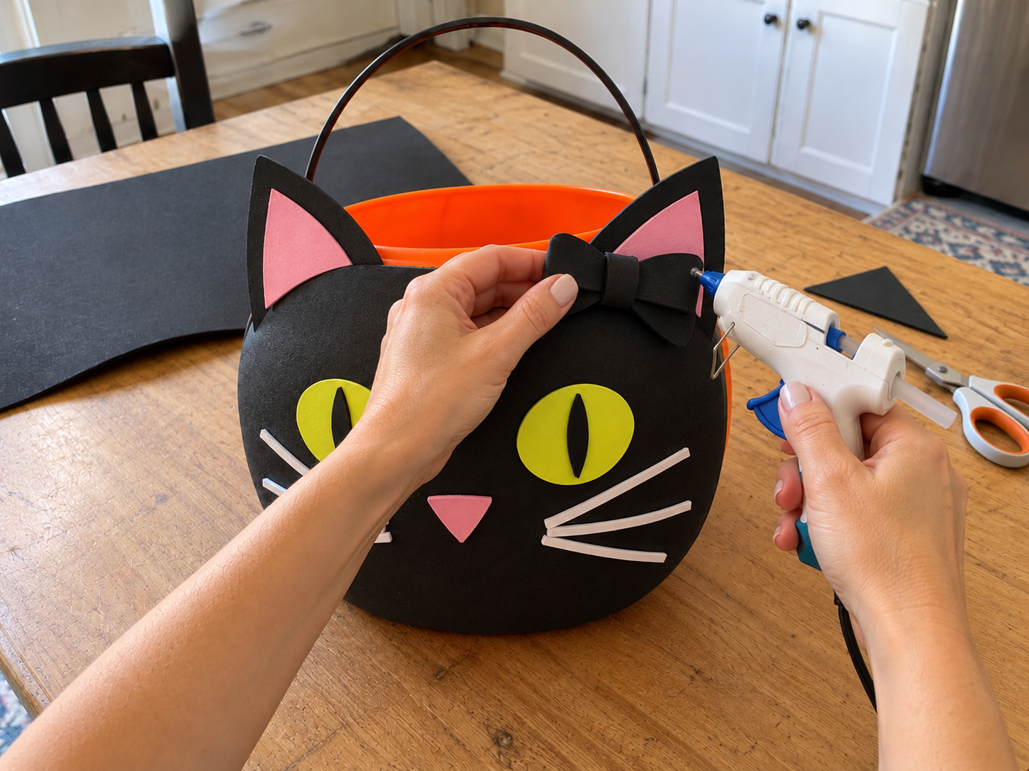 DIY Black Cat Foam Trick-or-Treat Bucket for Halloween Candy, step 5: Add a Decorative Bow