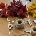 DIY Faux Fall Leaf & Wooden Bead Garland for Rustic Mantel Decor