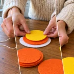 DIY Hand-Stitched Felt Candy Corn Coasters for Fall Home Decor