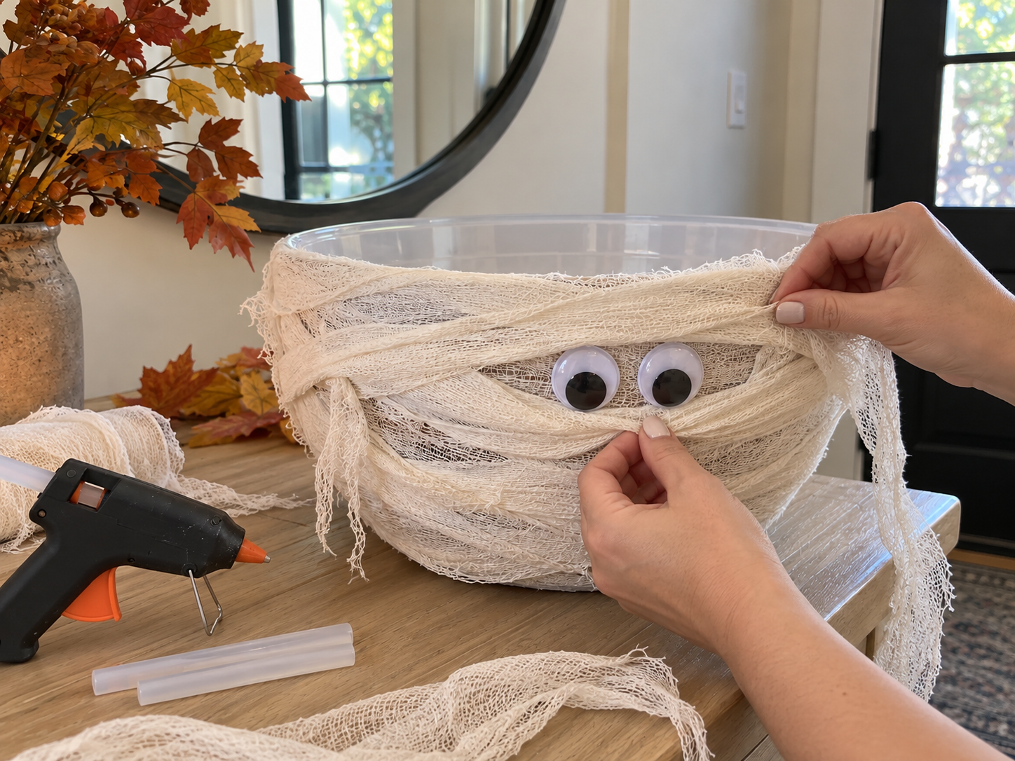 DIY Mummy Candy Bowl for Halloween Entryway or Party Decor, step 4: Attach Googly Eyes
