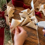 DIY Vintage Book Page Christmas Wreath with Burlap Bow and Pinecones
